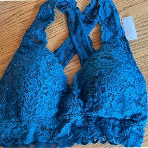 Teal flowered lace cross back lightly padded size XL.